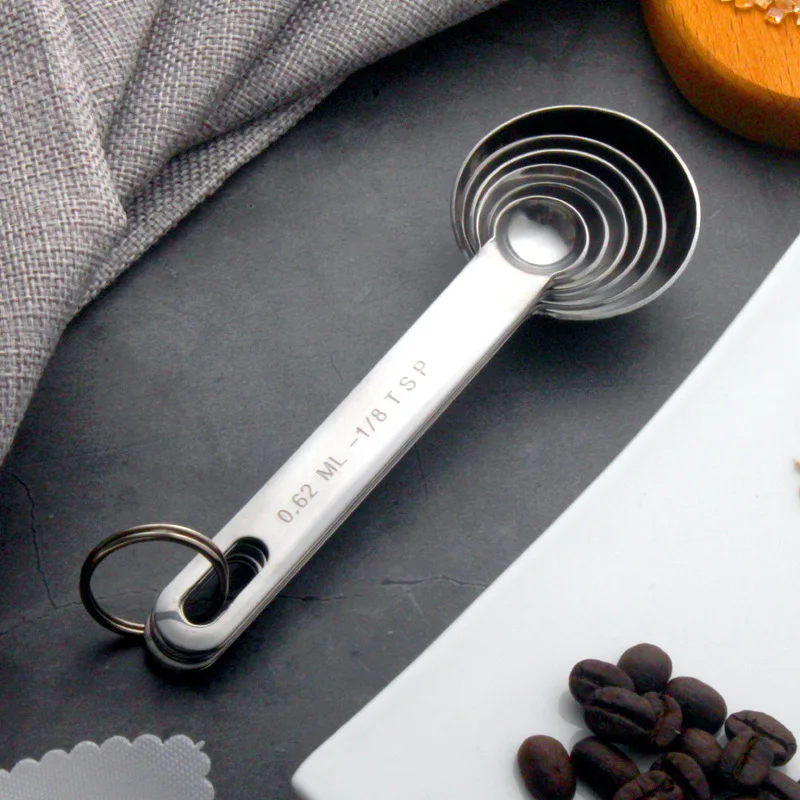 Cuchara medidora multiusos de  - Baking Powder Kitchen reseña y precio